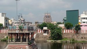 The stone gopuram and pillared halls of Sri Parthasarathyswamy Temple in Triplicane Chennai.