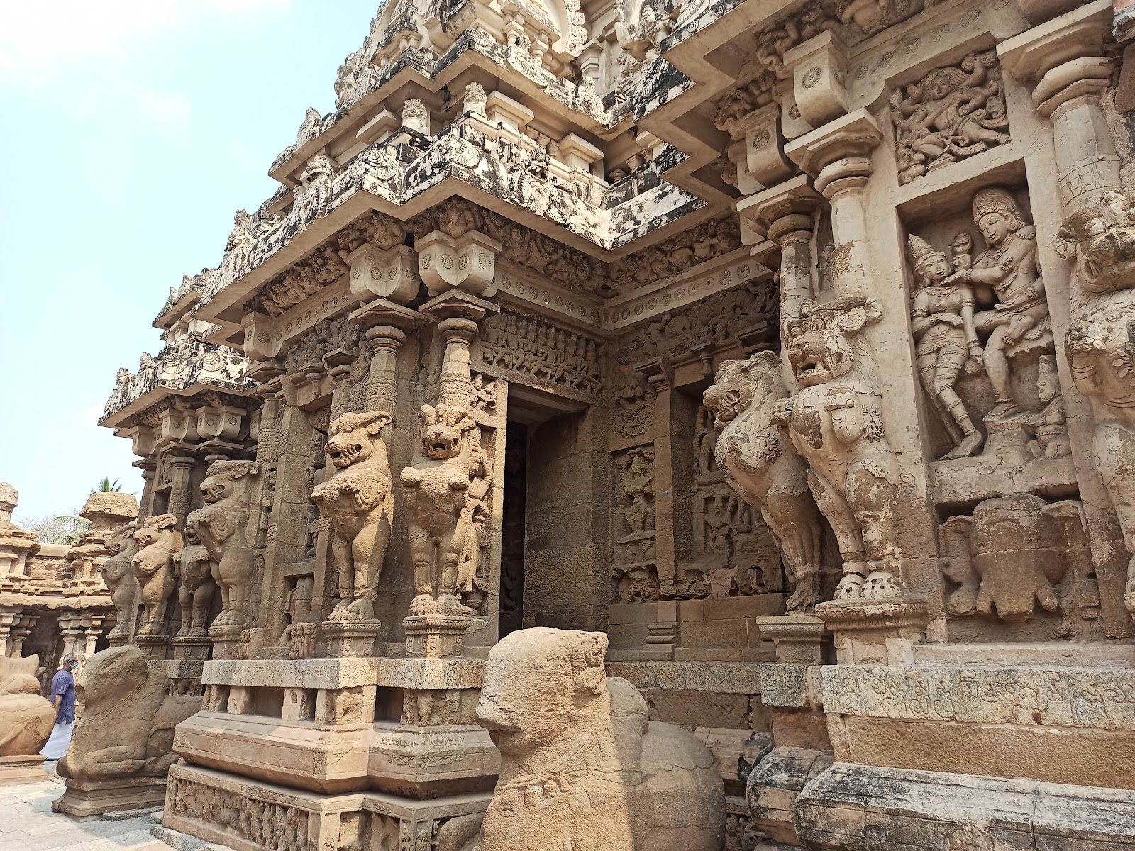 Ancient sandstone tower and carved courtyard cells of Kailasanatha Temple in Kanchipuram
